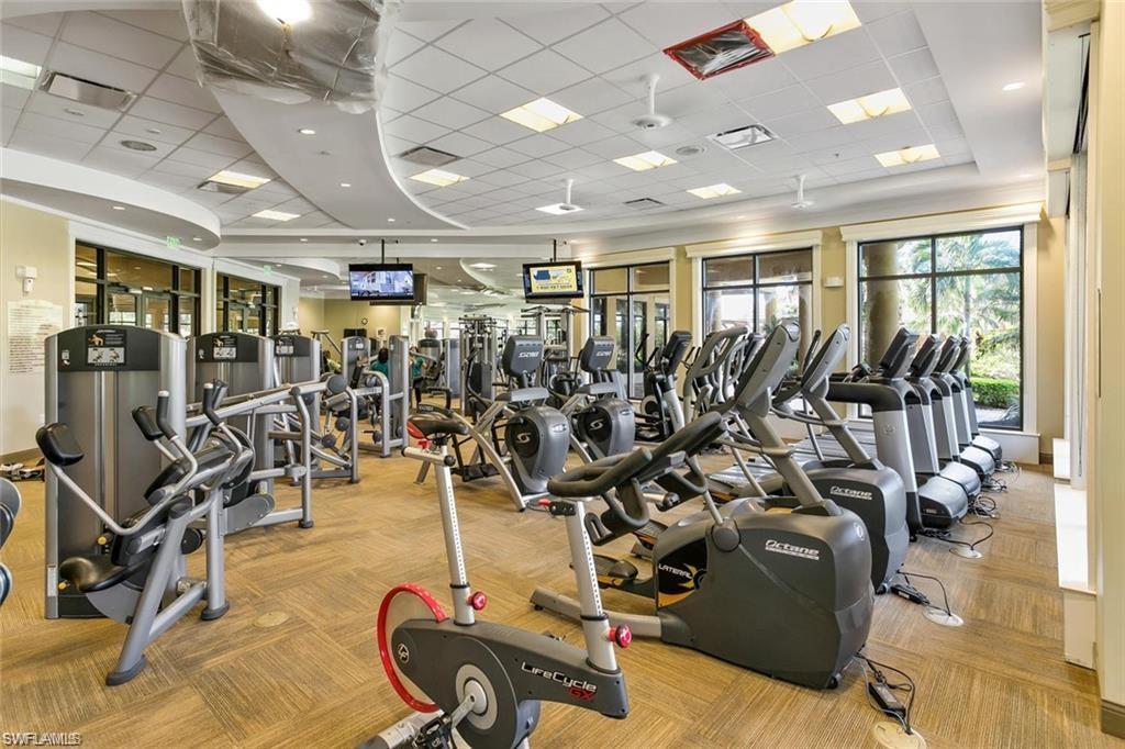 9578 Trevi Court, Unit 5142 Naples, FL 34113 - Photo 43 of 49 a view of a room with gym equipment