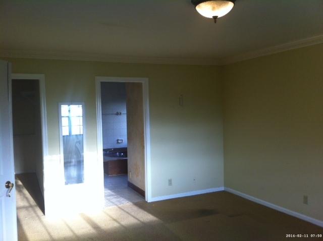 2298 Northwest 35th Street Boca Raton, FL 33431 - Photo 14 of 26 a view of a hallway with wooden shelves