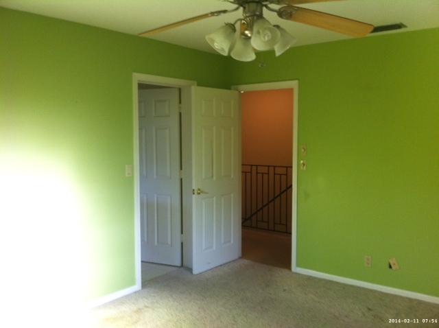 2298 Northwest 35th Street Boca Raton, FL 33431 - Photo 19 of 26 a view of a hallway with a yellow space