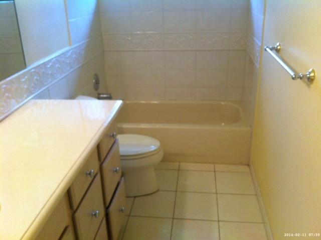 2298 Northwest 35th Street Boca Raton, FL 33431 - Photo 21 of 26 a bathroom with a sink a toilet and shower