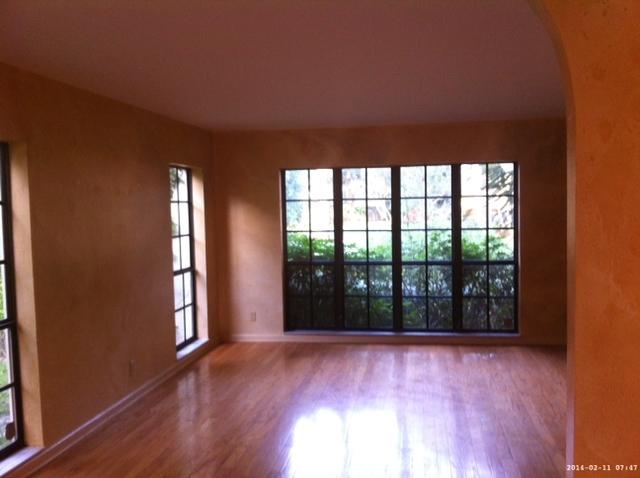 2298 Northwest 35th Street Boca Raton, FL 33431 - Photo 3 of 26 an empty room with wooden floor and windows