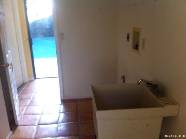 2298 Northwest 35th Street Boca Raton, FL 33431 - Photo 9 of 26 a bathroom with a bathtub