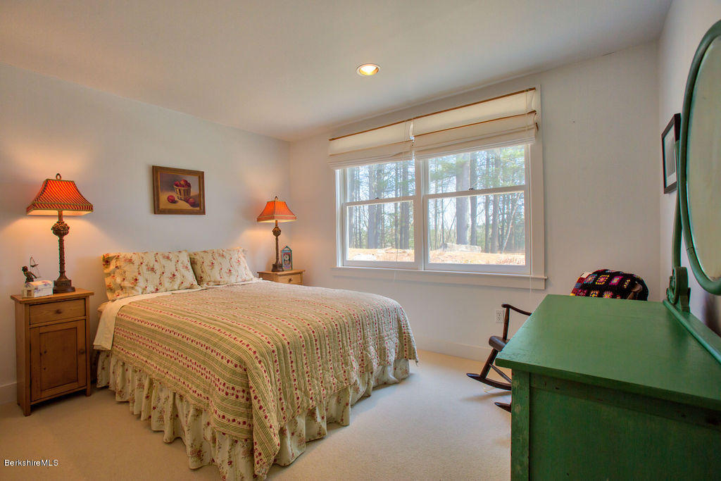 674 Foley Road Sheffield, MA 01257 - Photo 14 of 30 a bedroom with a bed and a window