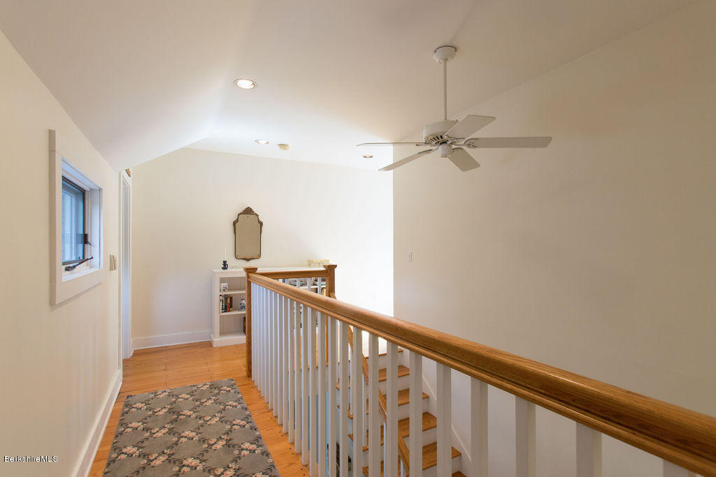 674 Foley Road Sheffield, MA 01257 - Photo 23 of 30 a view of a hallway with a window