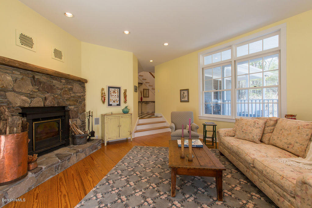 674 Foley Road Sheffield, MA 01257 - Photo 6 of 30 a living room with furniture and a fireplace