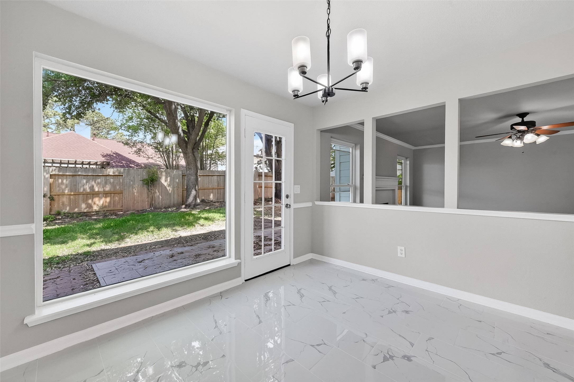18058 Golden Ridge Drive Houston, TX 77084 - Photo 12 of 35 a view of livingroom with furniture ceiling fan and windows