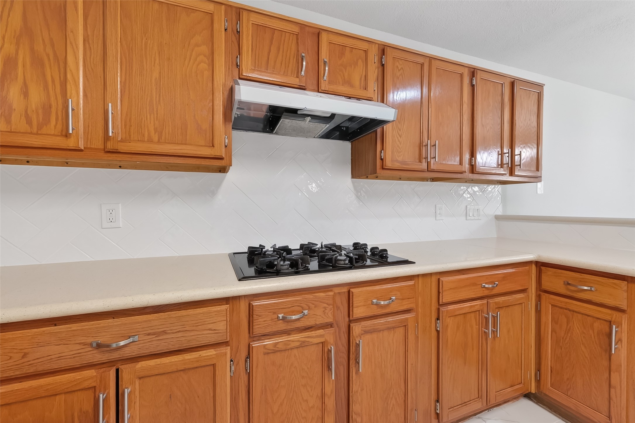 18058 Golden Ridge Drive Houston, TX 77084 - Photo 17 of 35 a kitchen with stainless steel appliances granite countertop a sink dishwasher stove and cabinets
