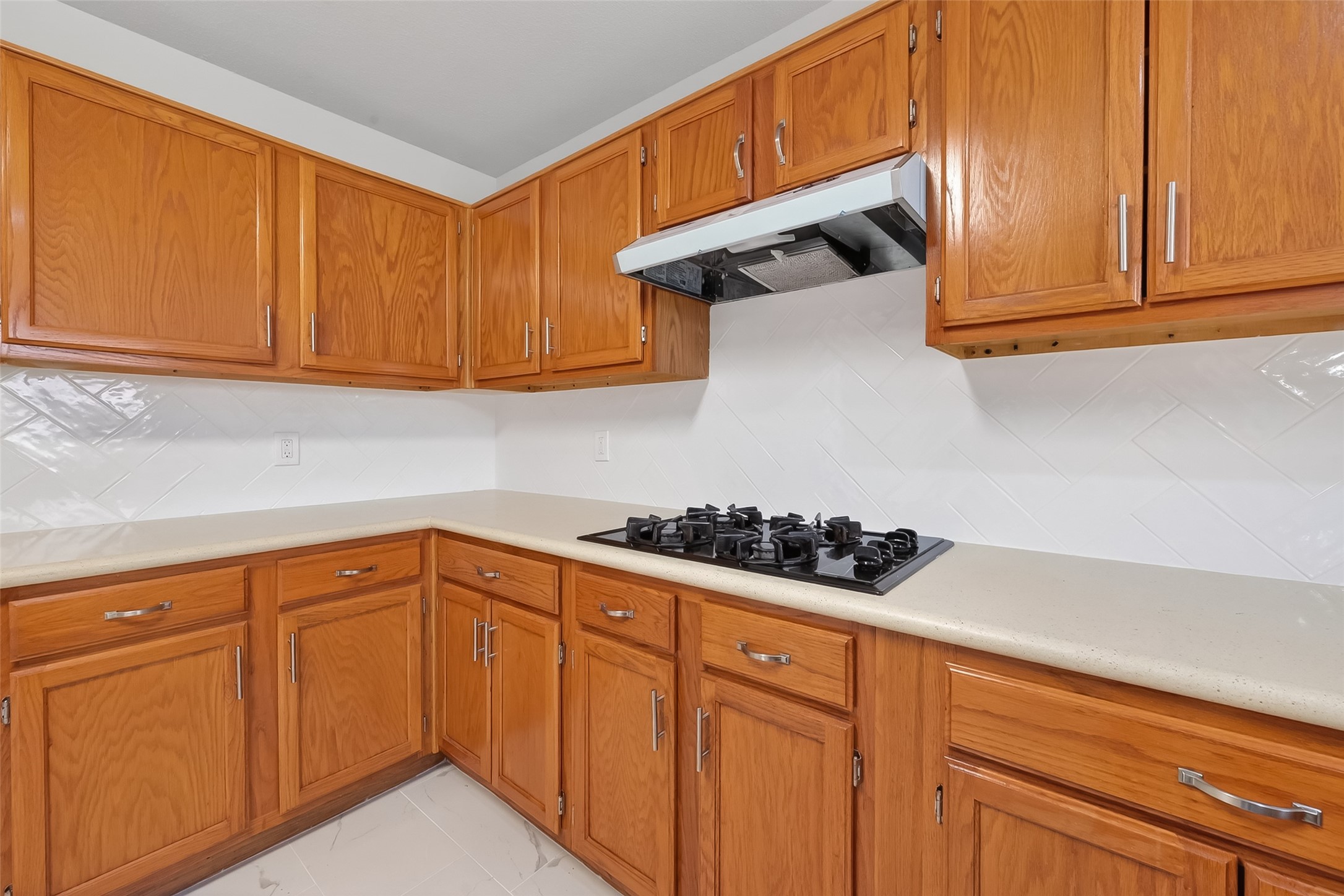18058 Golden Ridge Drive Houston, TX 77084 - Photo 18 of 35 a kitchen with stainless steel appliances granite countertop cabinets and a refrigerator