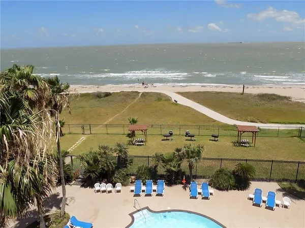 a view of a swimming pool and outdoor space