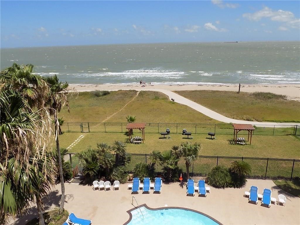4000 Surfside Boulevard, Unit 508 Corpus Christi, TX 78402 - Photo 19 of 32 a view of a swimming pool and outdoor space