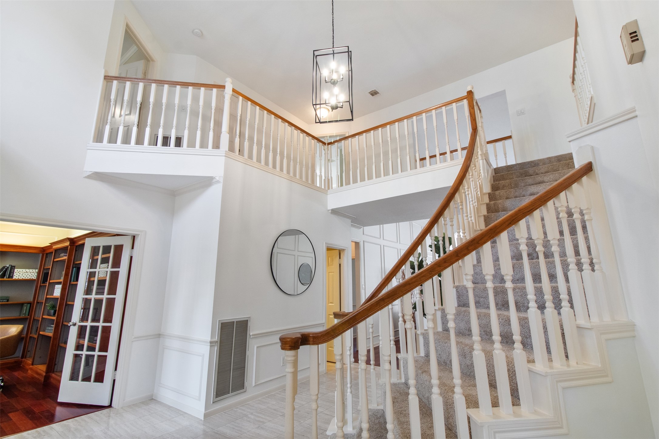 5127 Heathfield Court Houston, TX 77084 - Photo 20 of 37 This beautiful staircase greets you as you walk in and carries you up to the 3 secondary bedrooms and game room.