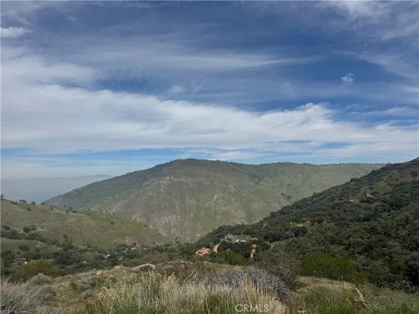 a view of mountain with lake view