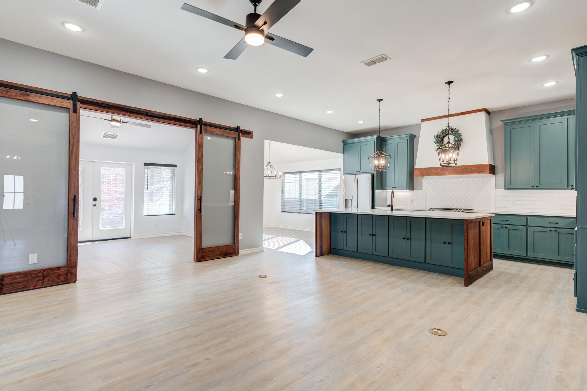 12701 Kenosha Avenue Lubbock, TX 79423 - Photo 16 of 61 a view of a kitchen with a sink and a large window