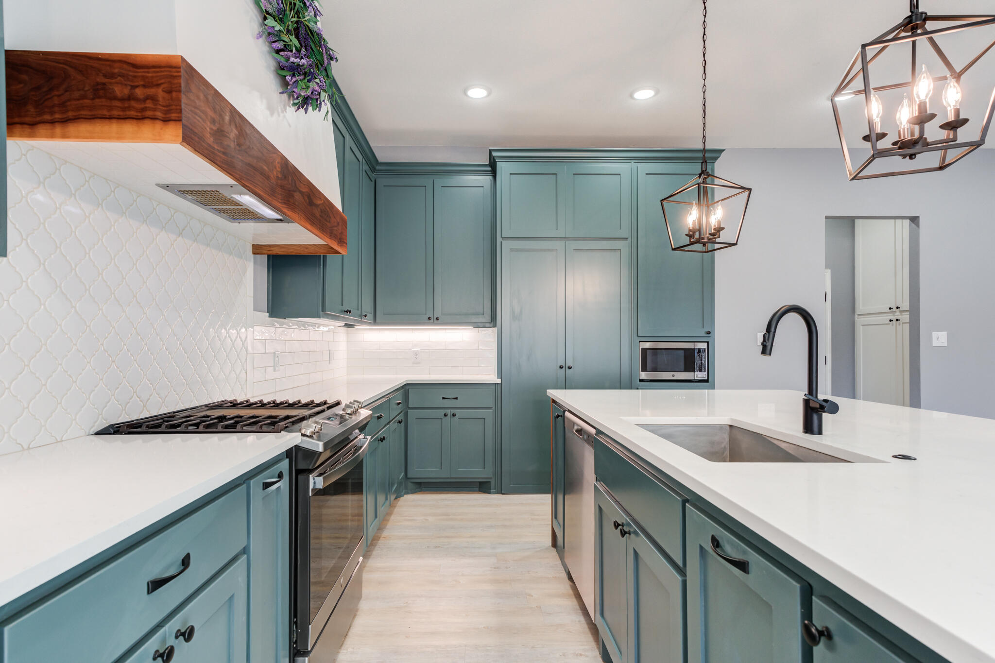 12701 Kenosha Avenue Lubbock, TX 79423 - Photo 21 of 61 a kitchen with stainless steel appliances granite countertop a sink and stove