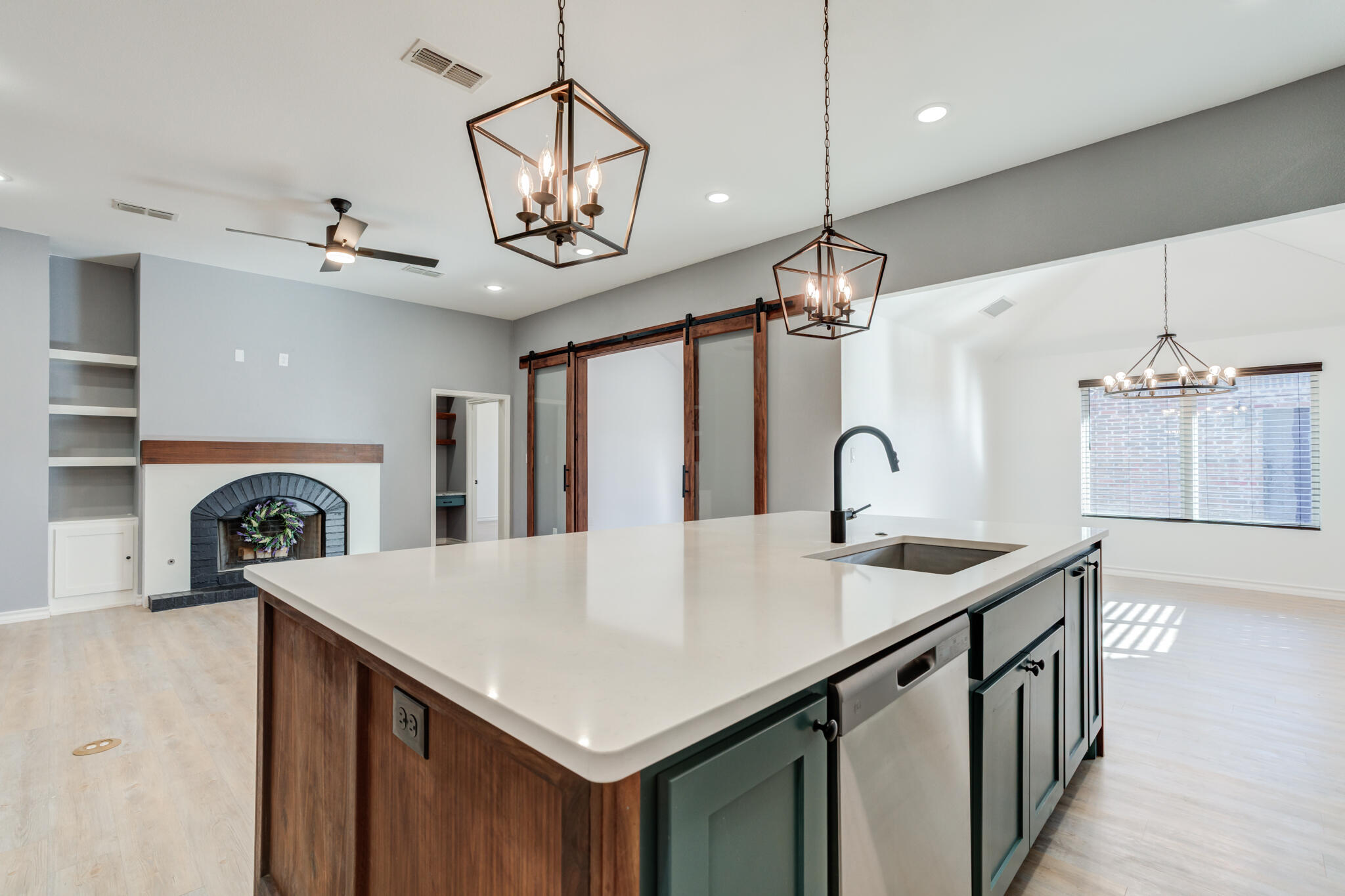 12701 Kenosha Avenue Lubbock, TX 79423 - Photo 27 of 61 a kitchen that has a lot of cabinets and a wooden floor