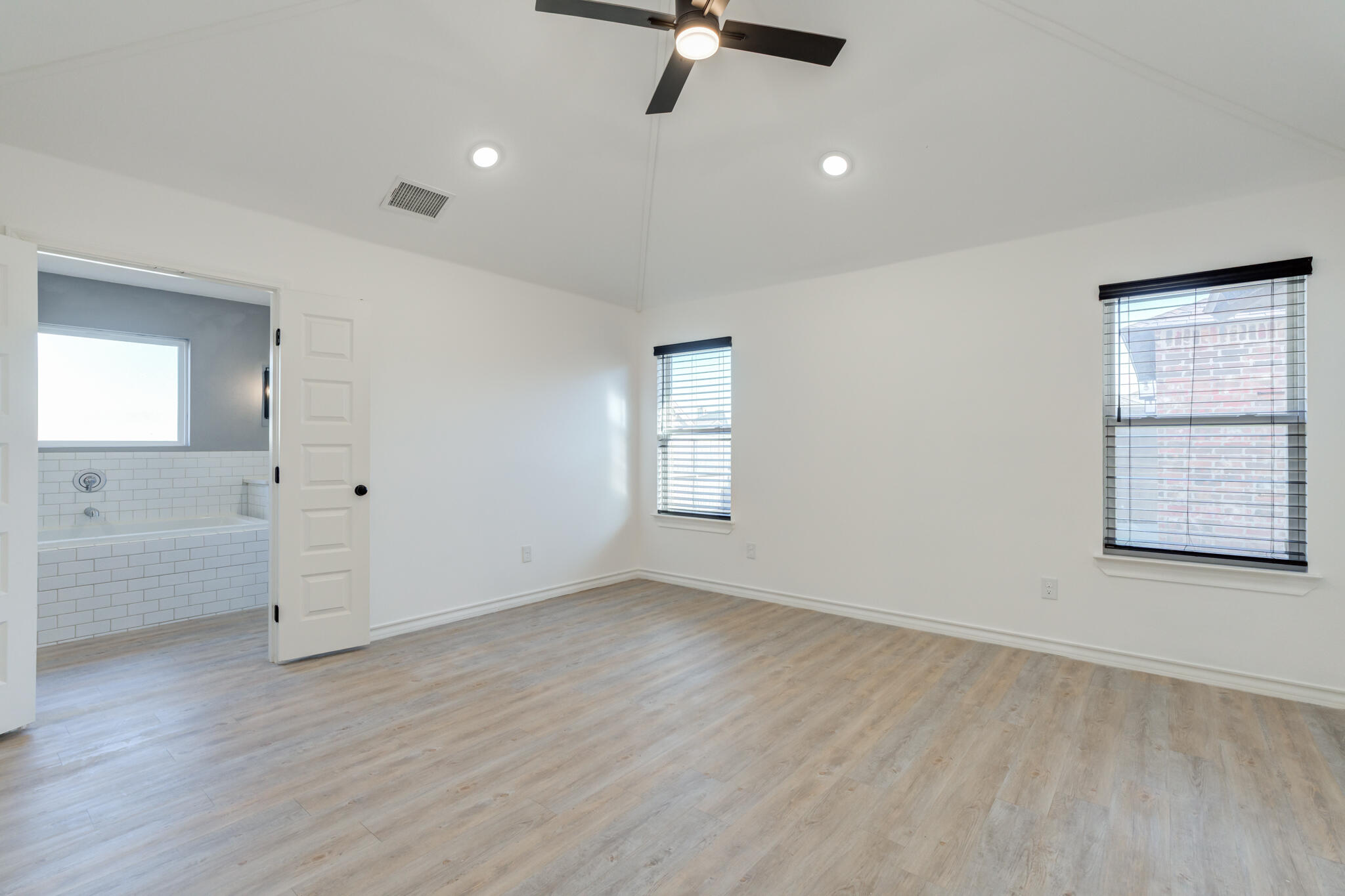 12701 Kenosha Avenue Lubbock, TX 79423 - Photo 36 of 61 wooden floor in an empty room with a window