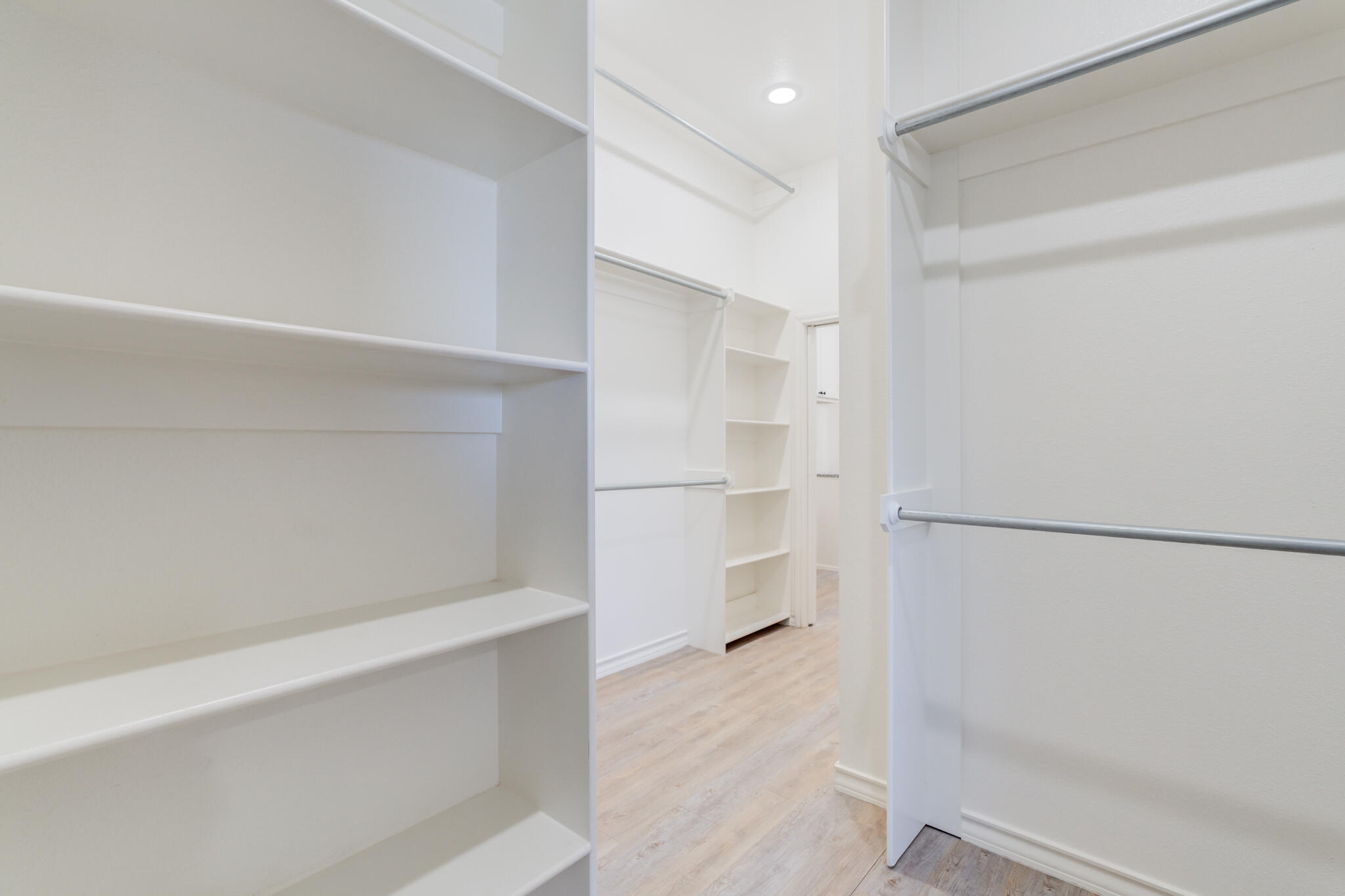 12701 Kenosha Avenue Lubbock, TX 79423 - Photo 40 of 61 a view of walk in closet with empty racks