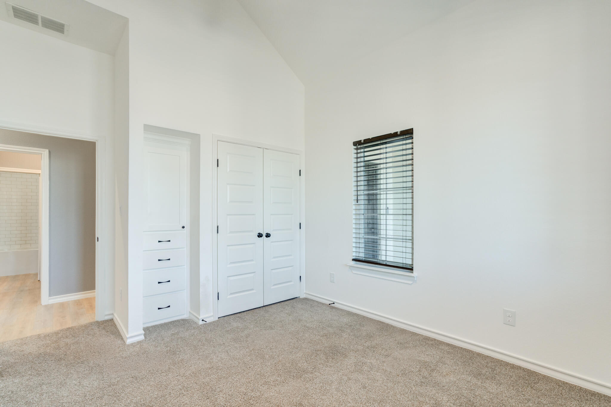 12701 Kenosha Avenue Lubbock, TX 79423 - Photo 43 of 61 an empty room with windows and closet