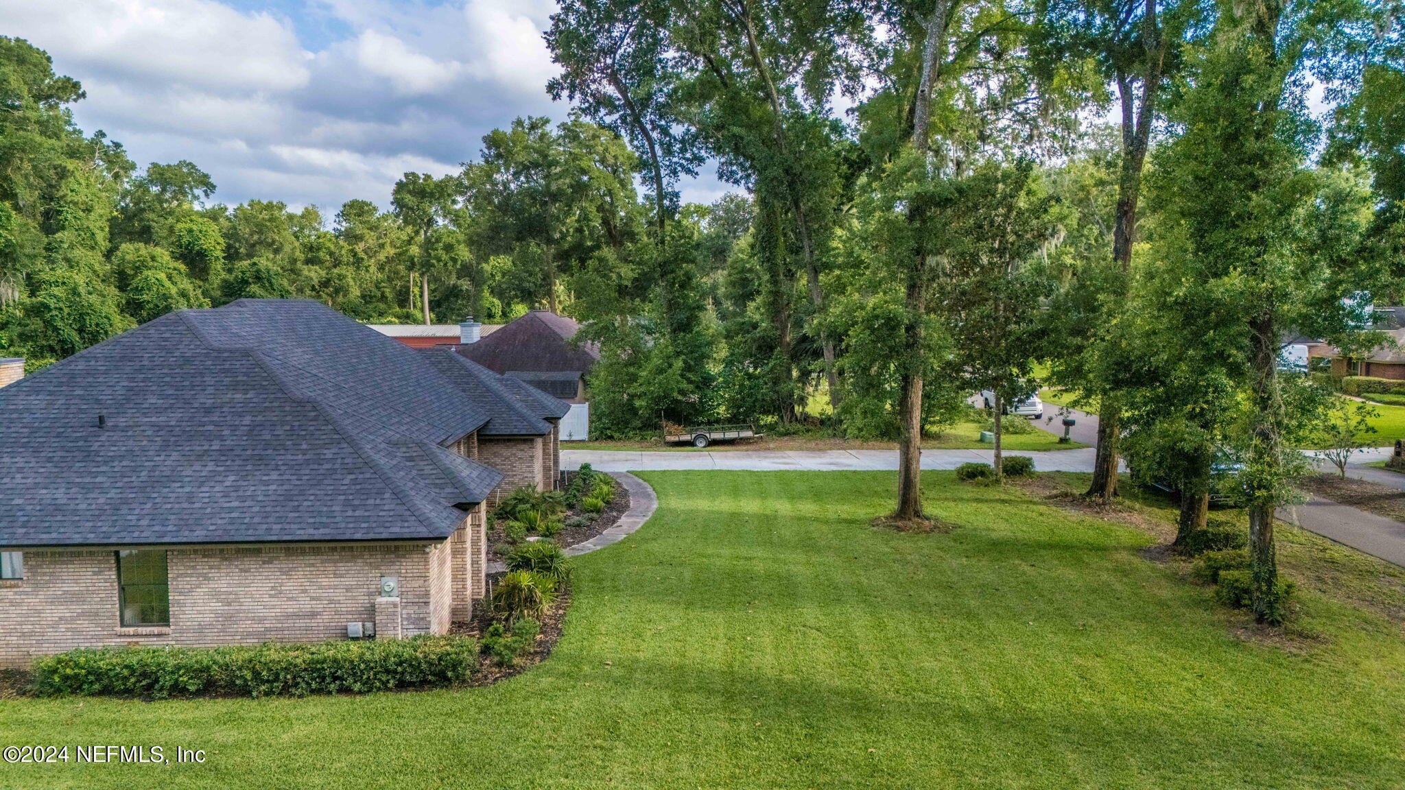 431 Cheryl Court St. Johns, FL 32259 - Photo 27 of 41 a view of a house with a yard and a large tree