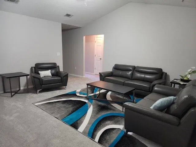 a living room with furniture