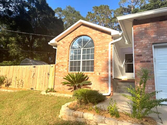 252 Panama Drive Crestview, FL 32536 - Photo 6 of 36 a front view of a house with a yard