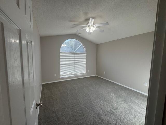 252 Panama Drive Crestview, FL 32536 - Photo 8 of 36 an empty room with chandelier fan and windows
