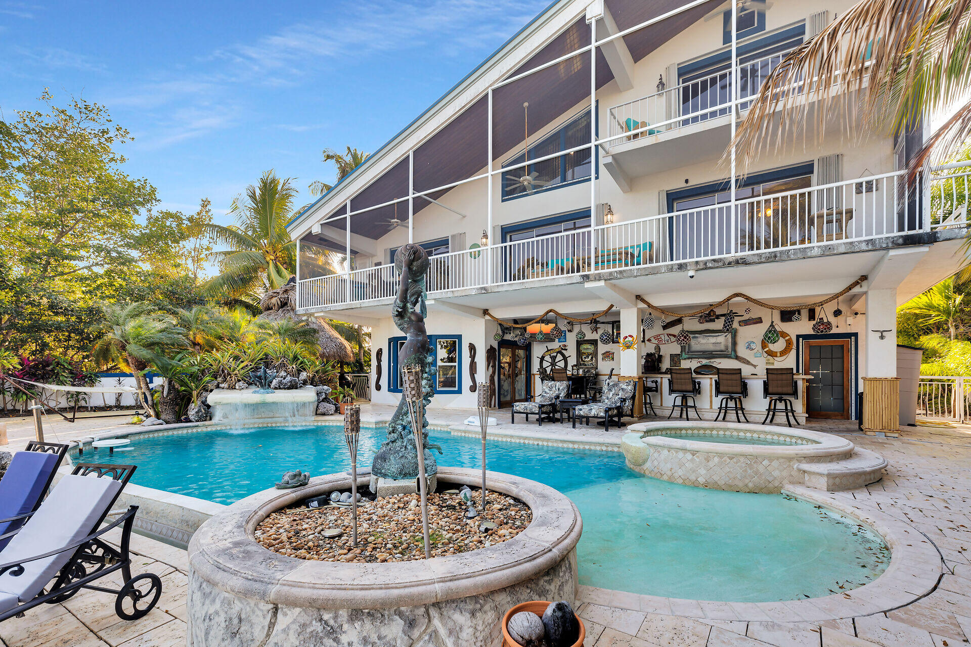 35 Mutiny Place Key Largo, FL 33037 - Photo 2 of 59 a view of a water fountain in front of building