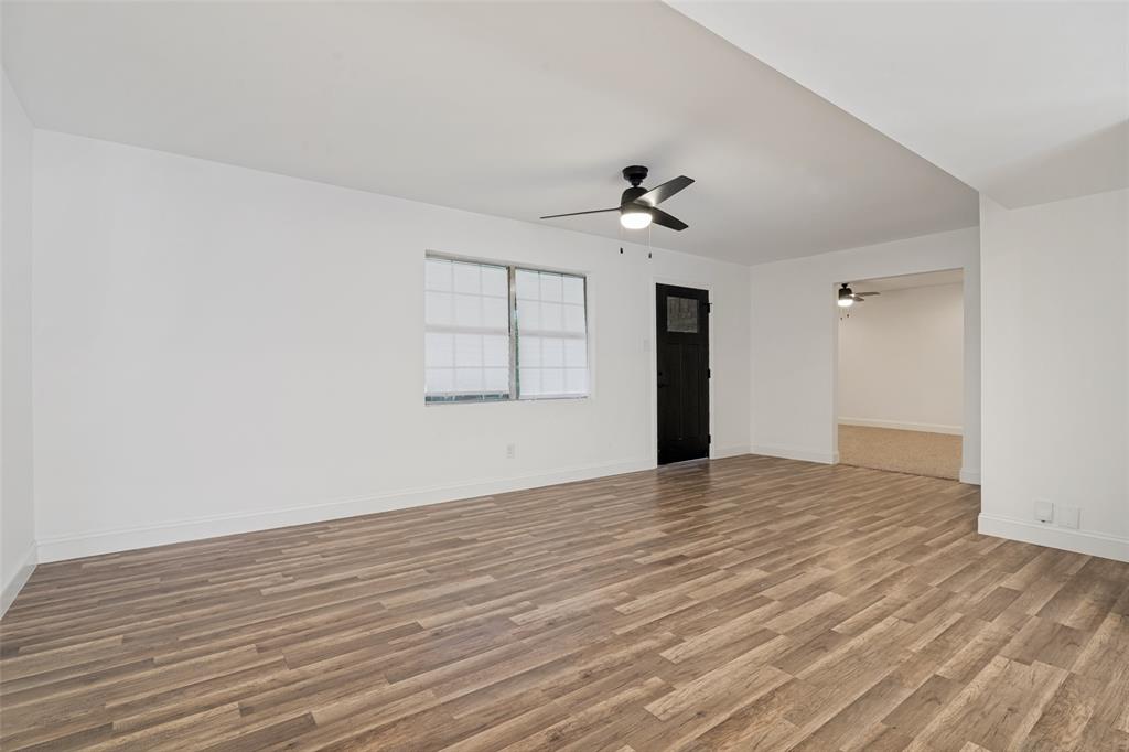 110 Weaver Street Forney, TX 75126 - Photo 5 of 25 Living Room looking at entry door from dining room