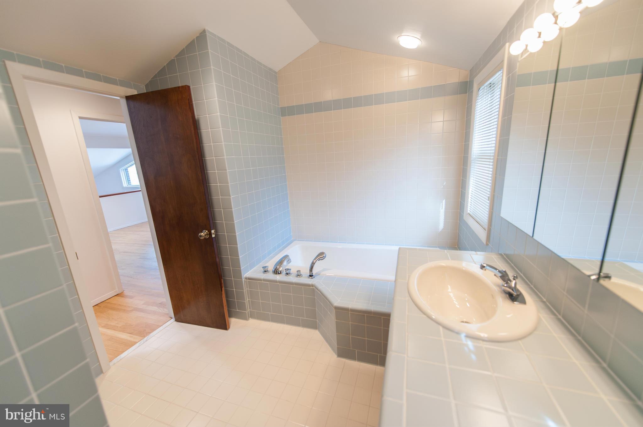 15816 Laughlin Lane Silver Spring, MD 20906 - Photo 18 of 30 Full Bath Upper Hallway
