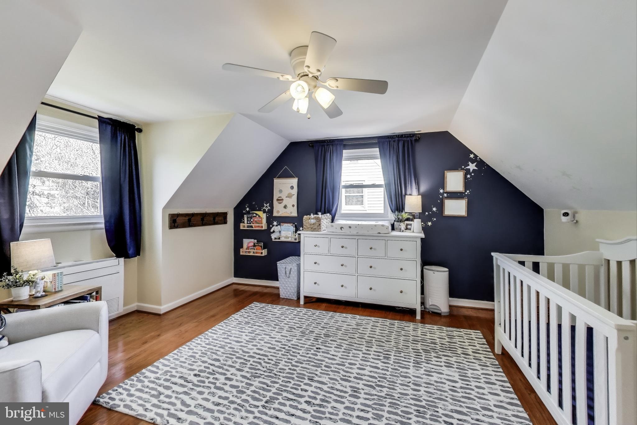 3316 Harrell Street Silver Spring, MD 20906 - Photo 20 of 38 a view of a livingroom with furniture and staircase