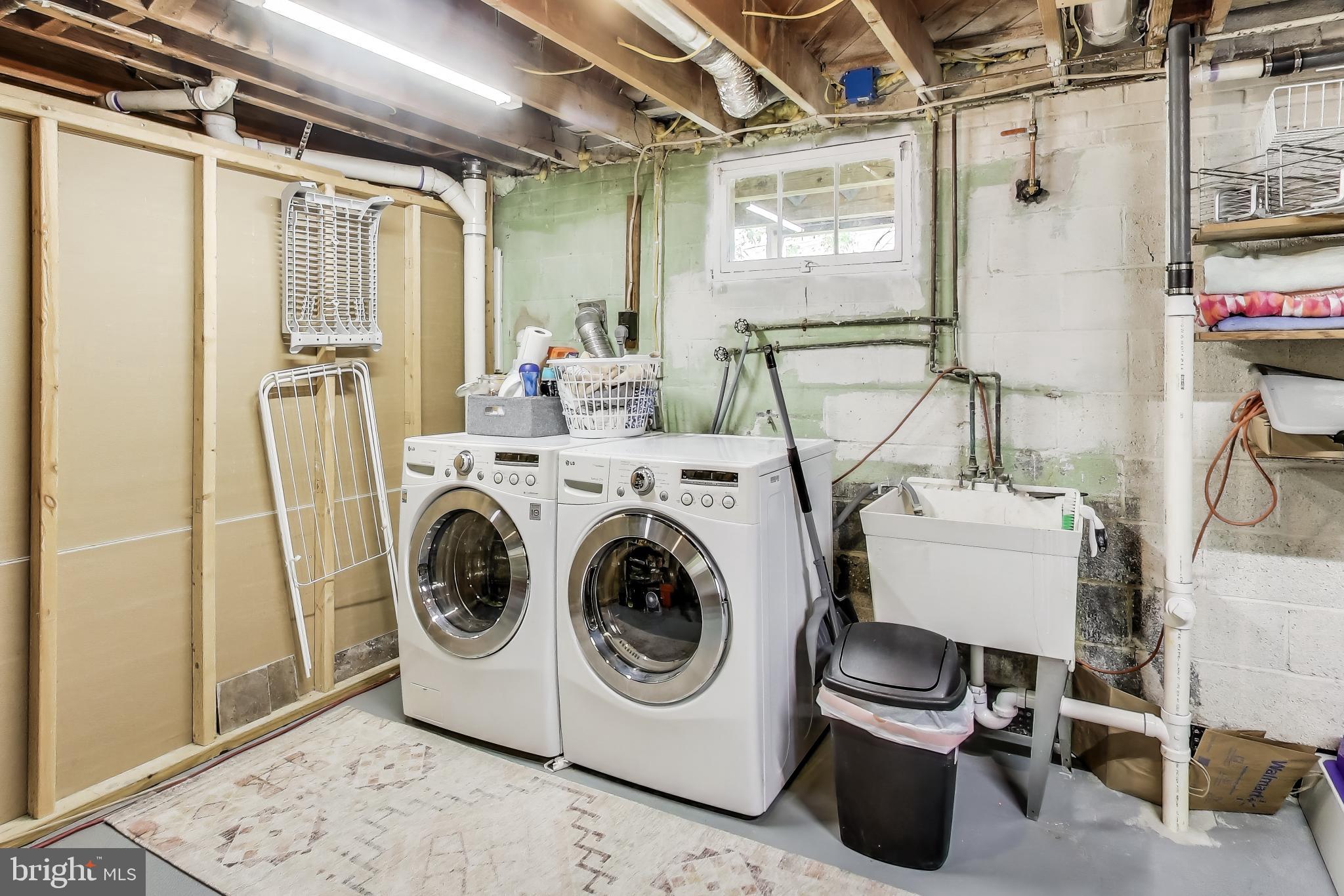 3316 Harrell Street Silver Spring, MD 20906 - Photo 27 of 38 a utility room with dryer and washer