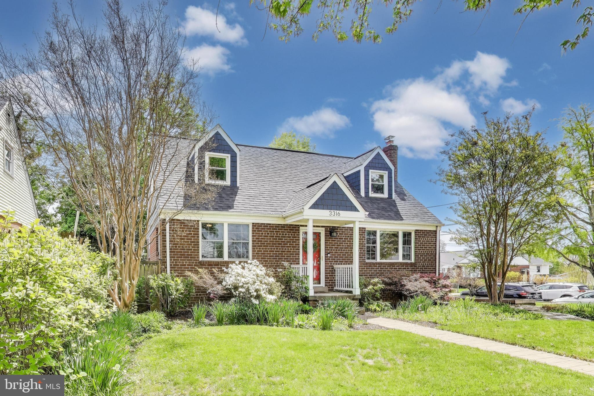 3316 Harrell Street Silver Spring, MD 20906 - Photo 38 of 38 a front view of a house with garden