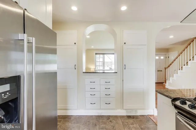 a view of a kitchen with a sink