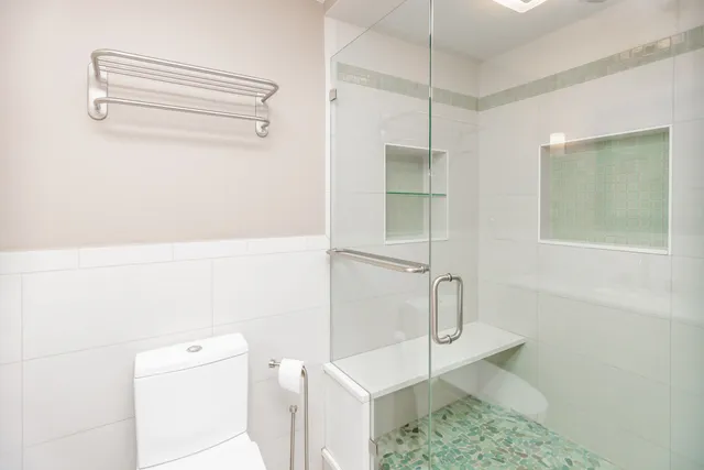 a view of a balcony with mountain view and wooden floor