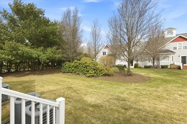 a view of a yard with swimming pool