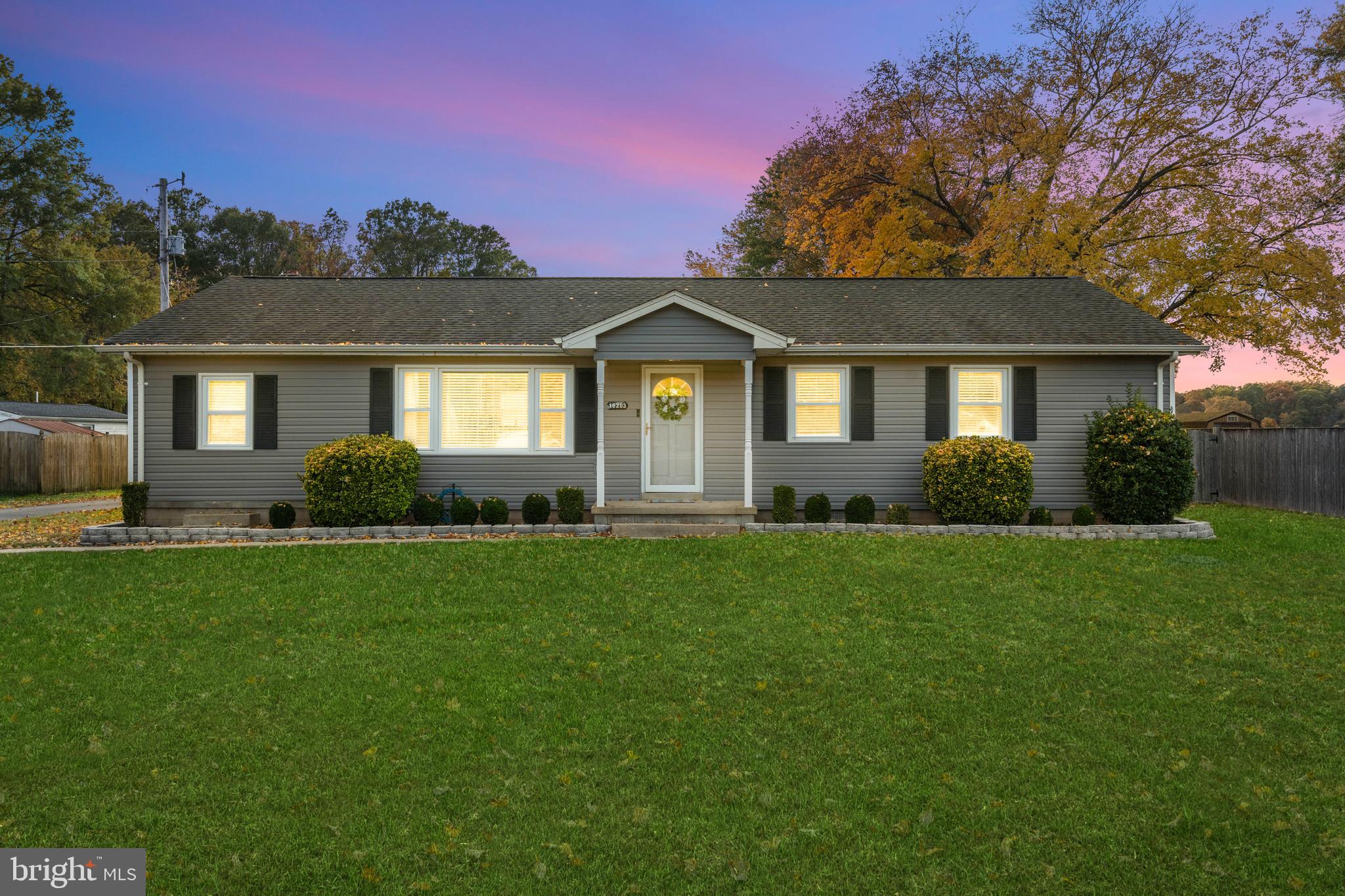 16203 Brandywine Road Brandywine, MD 20613 - Photo 2 of 37 a front view of a house with a garden