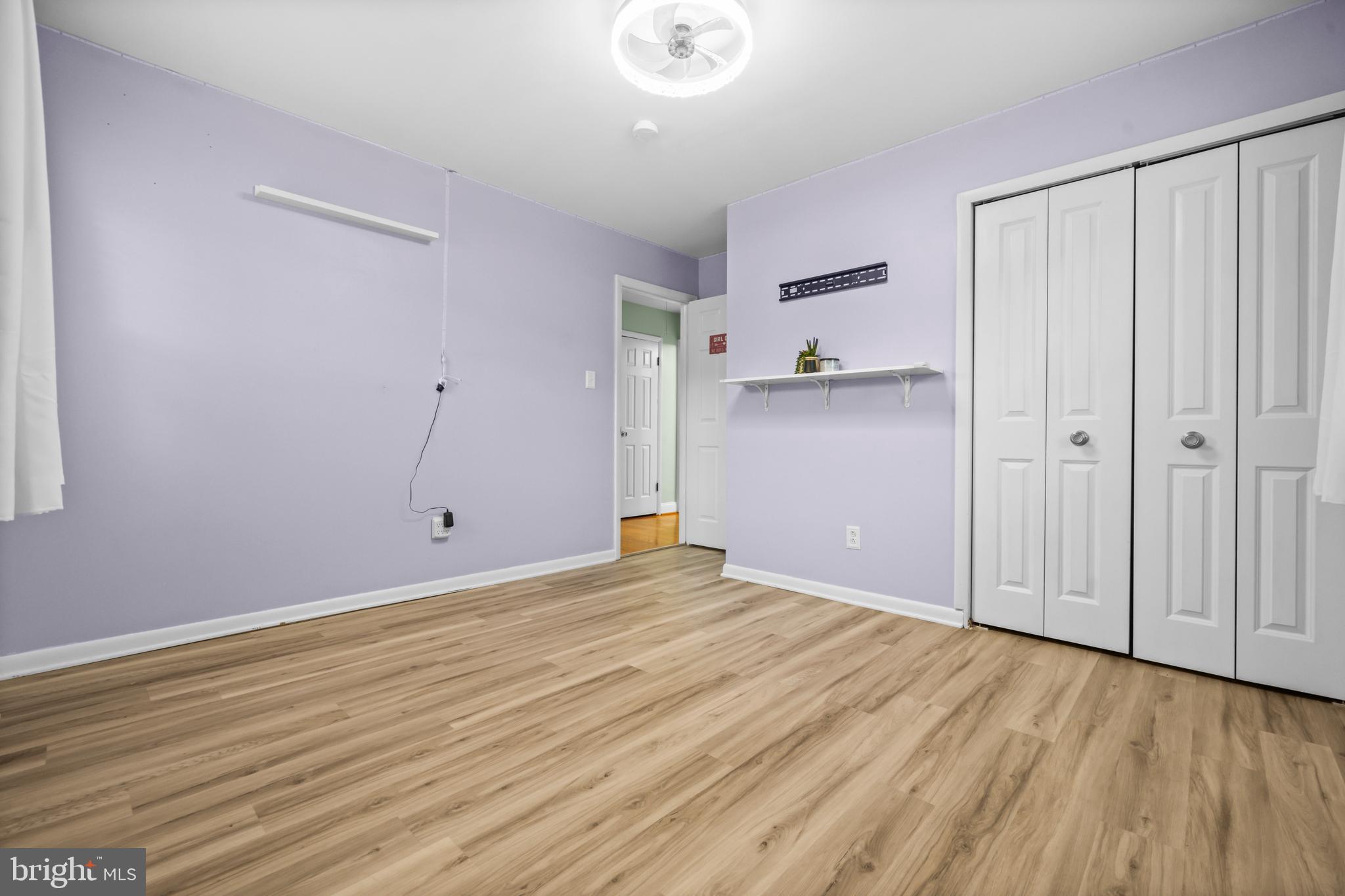 16203 Brandywine Road Brandywine, MD 20613 - Photo 23 of 37 a view of empty room with wooden floor