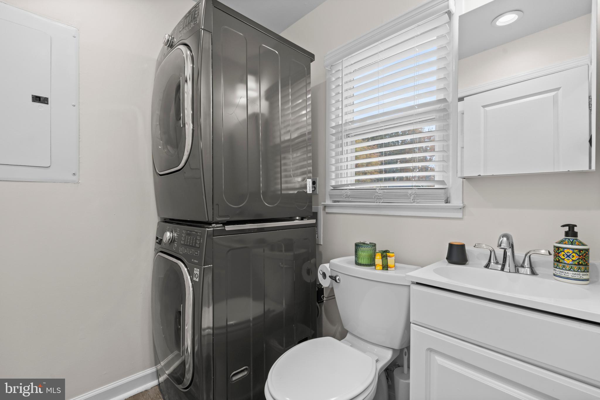 16203 Brandywine Road Brandywine, MD 20613 - Photo 27 of 37 a bathroom with a toilet and a sink