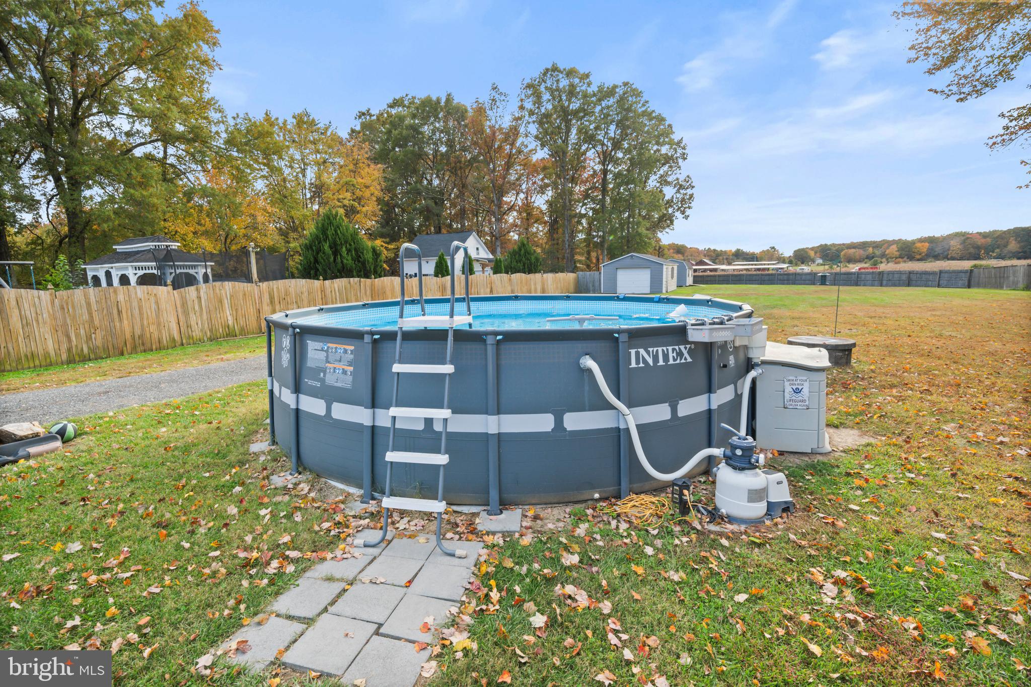16203 Brandywine Road Brandywine, MD 20613 - Photo 35 of 37 a view of a swimming pool with a patio