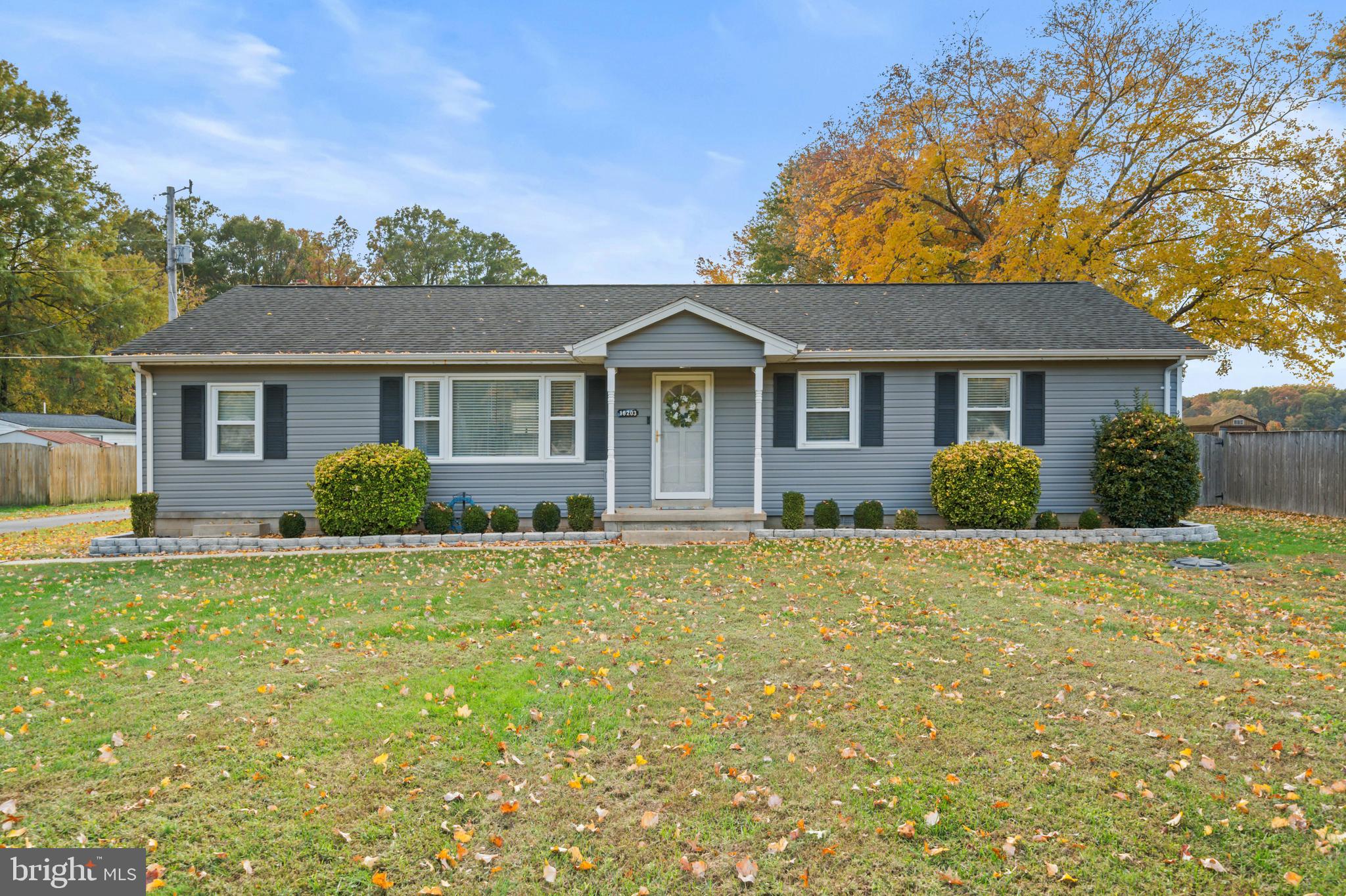 16203 Brandywine Road Brandywine, MD 20613 - Photo 36 of 37 a front view of a house with a garden
