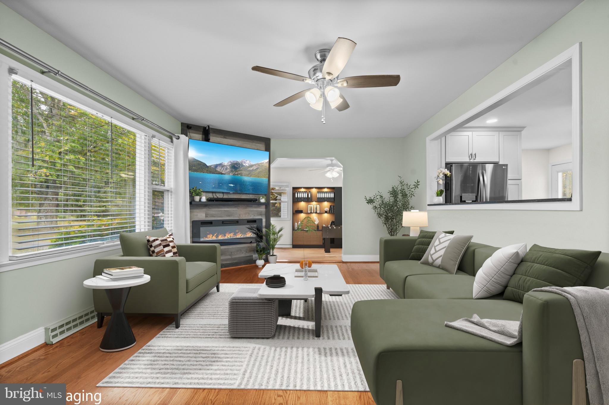 16203 Brandywine Road Brandywine, MD 20613 - Photo 8 of 37 a living room with furniture and a large window