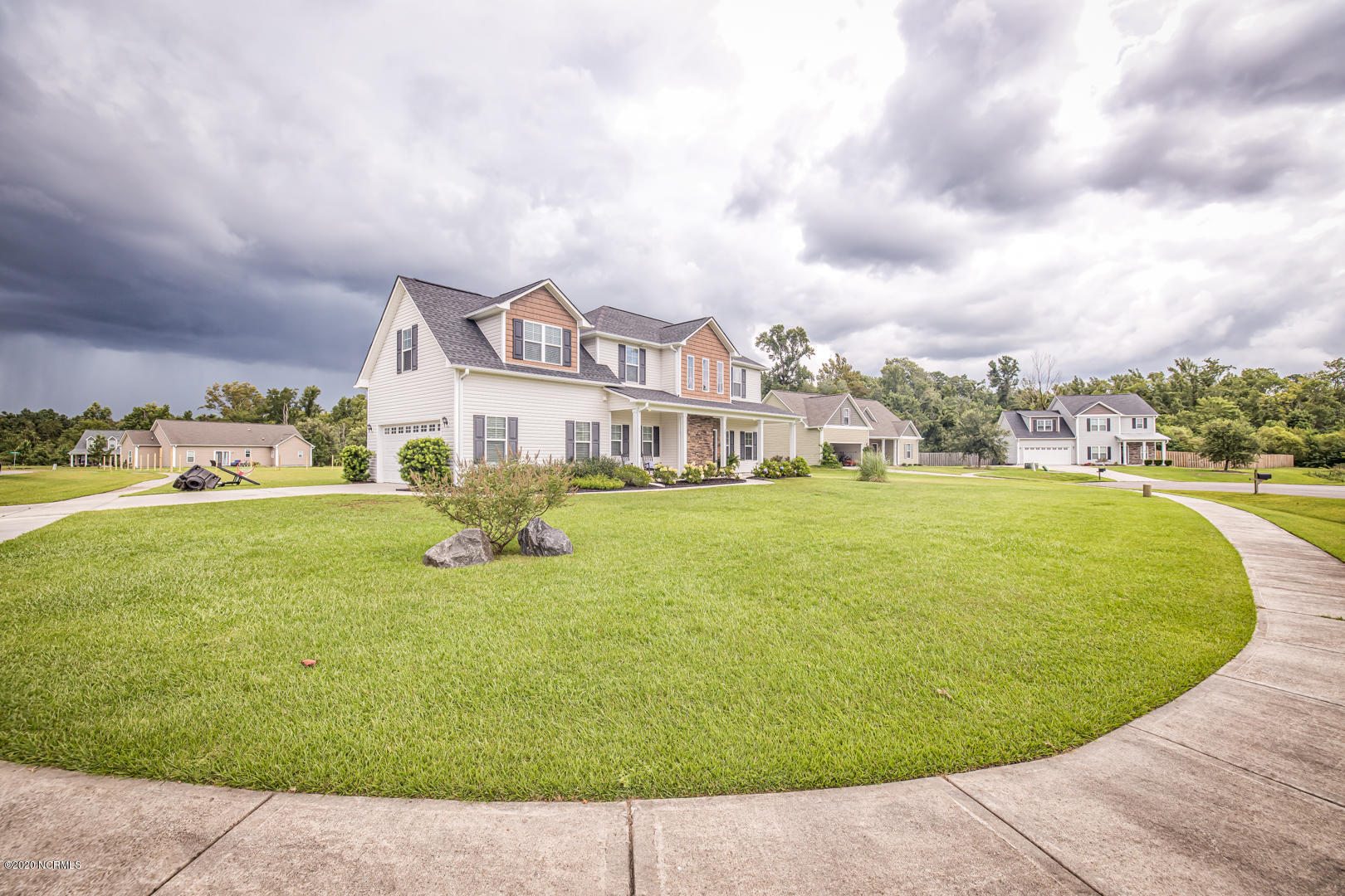 25 East Tumbling Waters Road Rocky Point, NC 28457 - Photo 1 of 22 front