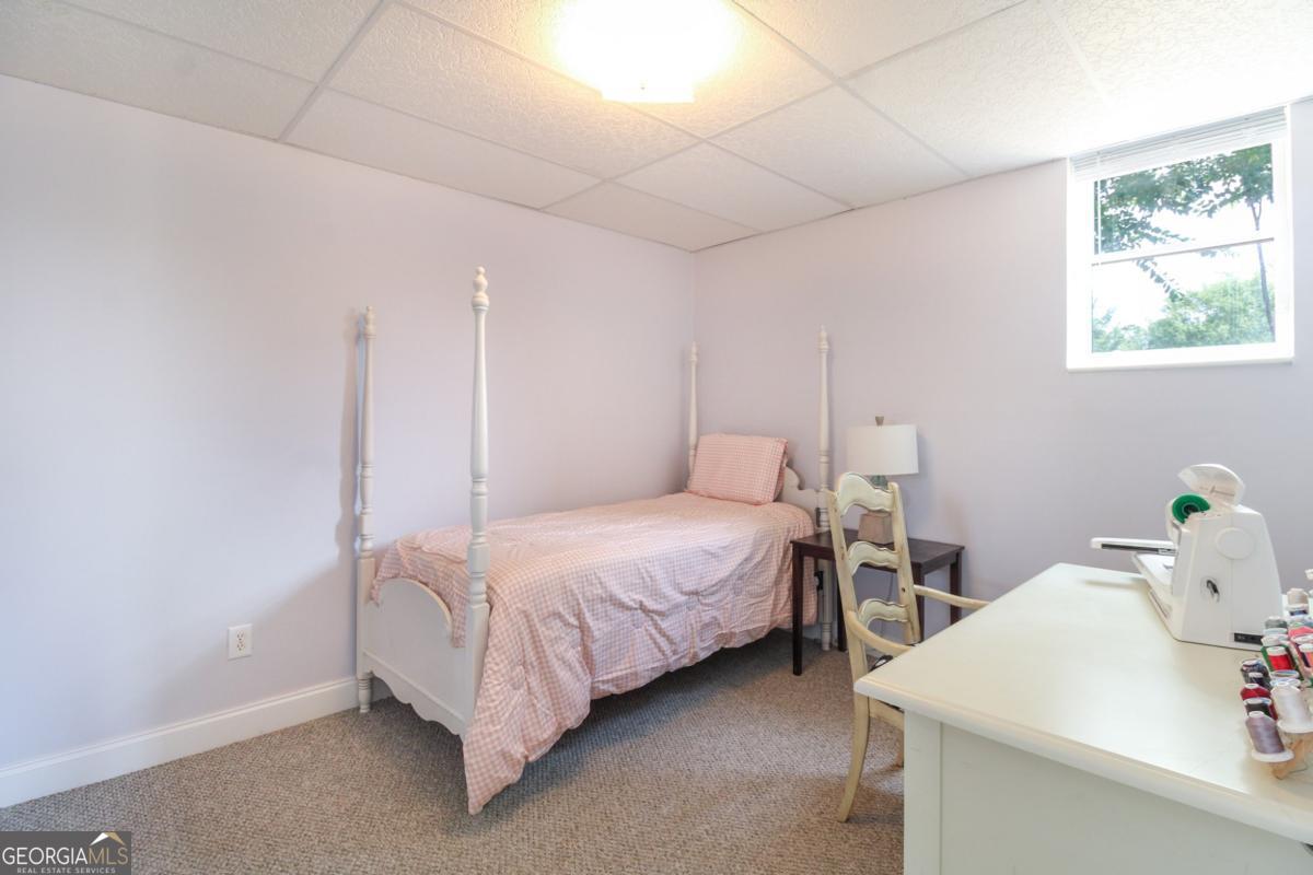 1380 Sunset Ridge Watkinsville, GA 30677 - Photo 40 of 74 a bed room with a bed and a table
