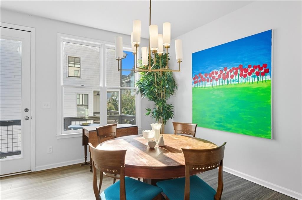 1157 Rambler Cross Atlanta, GA 30312 - Photo 15 of 49 a view of a dining room with furniture window and wooden floor