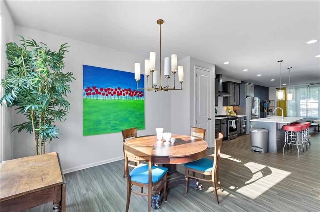 1157 Rambler Cross Atlanta, GA 30312 - Photo 19 of 49 a view of a dining room with furniture window and wooden floor