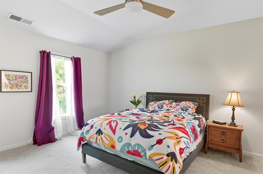 1157 Rambler Cross Atlanta, GA 30312 - Photo 31 of 49 a bedroom with a bed and a window