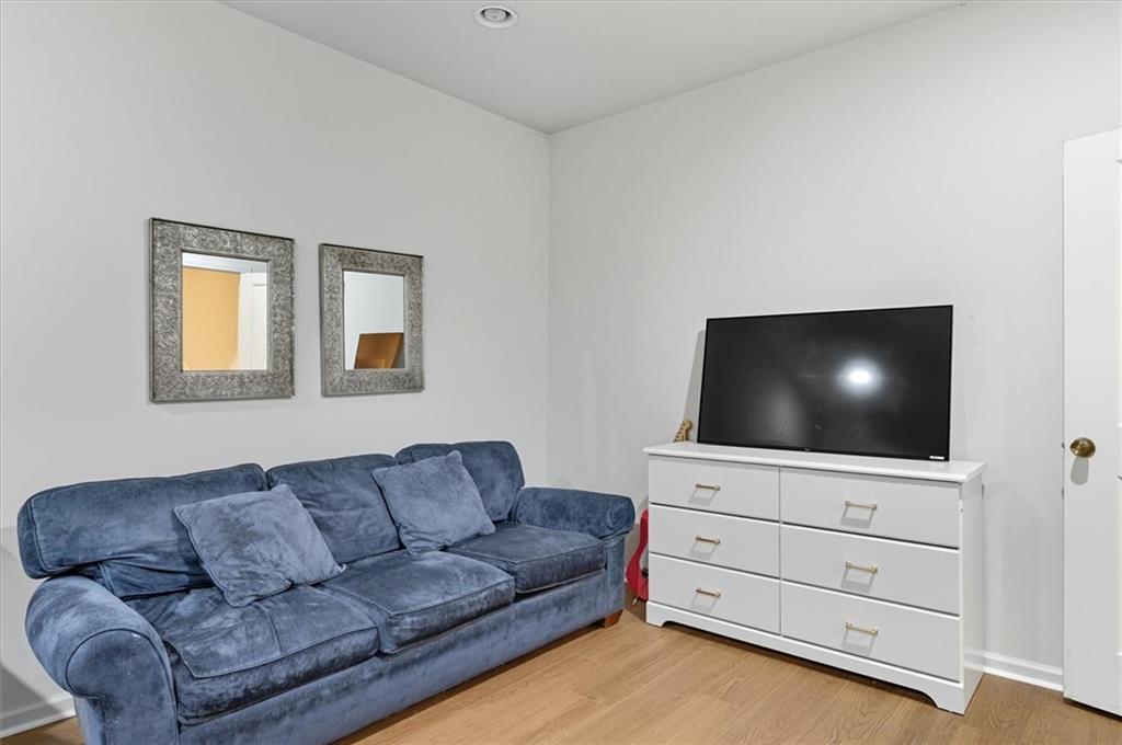 1157 Rambler Cross Atlanta, GA 30312 - Photo 40 of 49 a living room with furniture and a flat screen tv