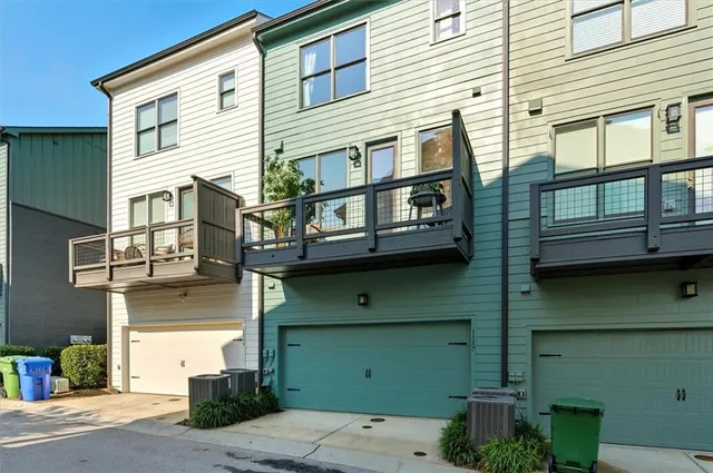 a front view of a house with a garage