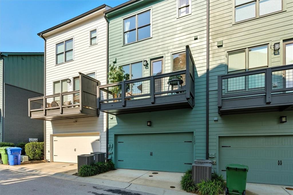 1157 Rambler Cross Atlanta, GA 30312 - Photo 46 of 49 a front view of a house with a garage