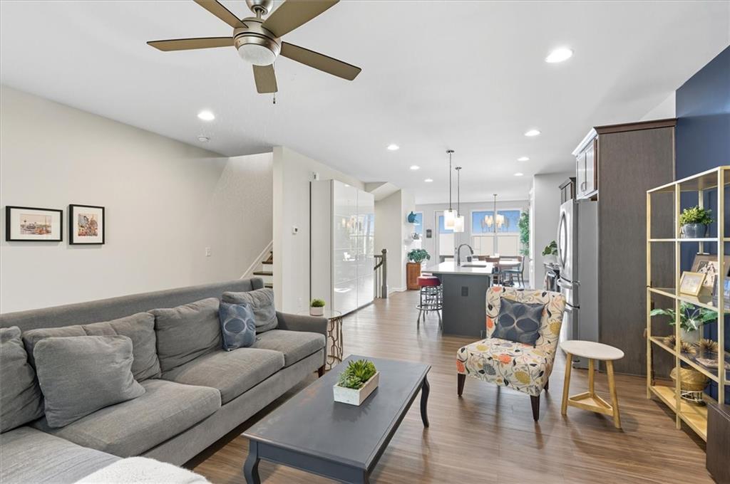 1157 Rambler Cross Atlanta, GA 30312 - Photo 7 of 49 a living room with furniture kitchen view and a wooden floor